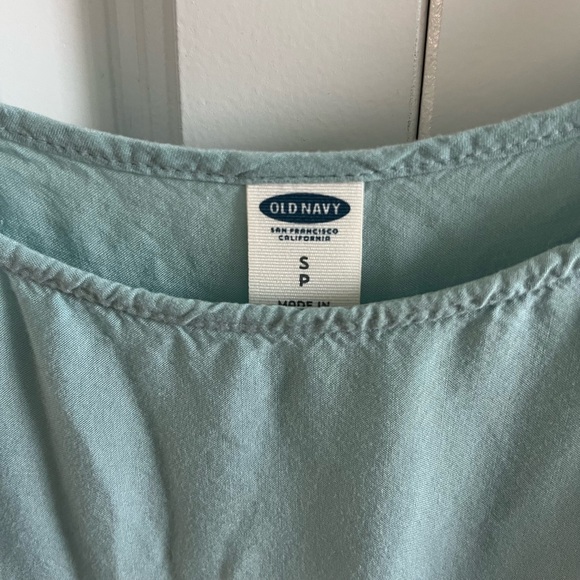 Blue tank top with adjustable straps and peplum detailing  along the bottom. - Picture 3 of 3